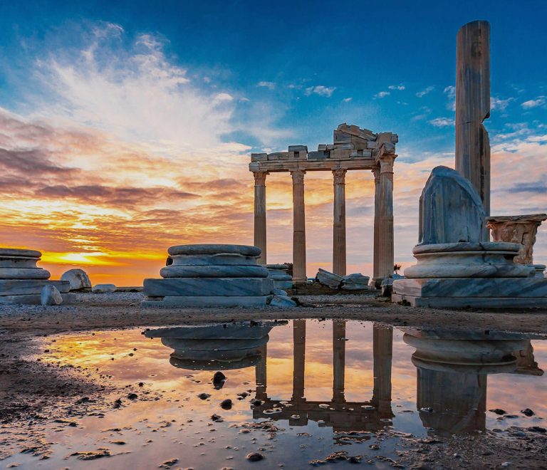 Side, Antalya, Turkey, ancient ruins, Roman theater, Temple of Apollo, Side Museum, Side Harbor, Side Promenade, Manavgat Waterfall, Mediterranean coast, beaches, coastal town, history, culture, tourism, travel, sightseeing, attractions, archaeological sites, coastal charm, Turkish destination, natural wonders, yachts, promenade, waterfront cafes, beach clubs, water sports, Taurus Mountains, greenery, picnic, swimming, boat trip, jet skiing, parasailing, pristine, crystal-clear waters, sun-kissed, captivating allure, antalya vip transfer, antalia vip transfer, vip transfer antalya.